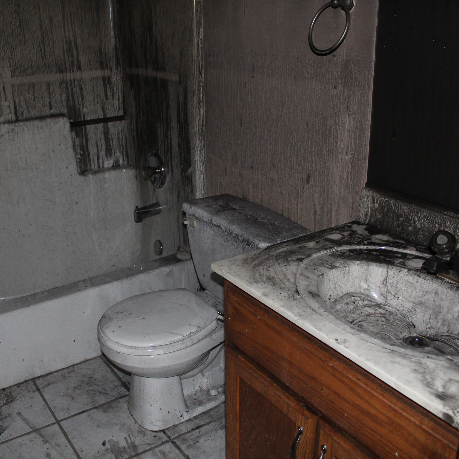 bathroom with fire damage. Soot and smoke damage in a bathroom.