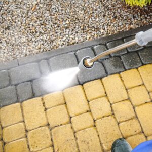 surface cleaning brick patio with power washer